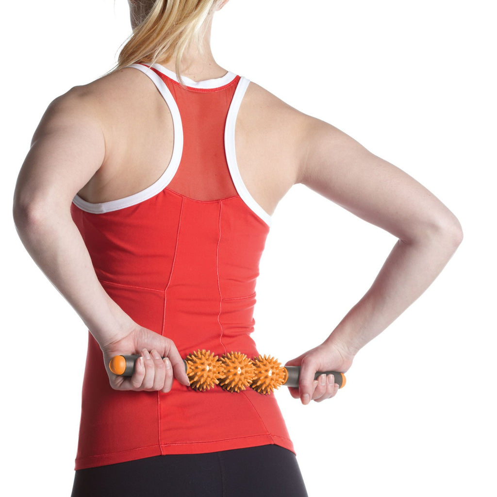 Restore Pressure Point Massager in use on lower back