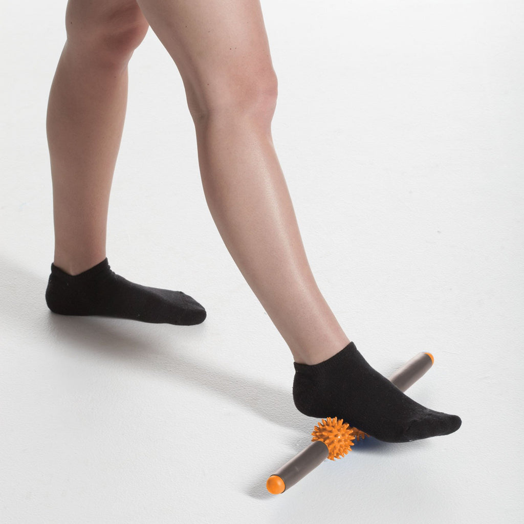 Restore Pressure Point Massager in use on foot