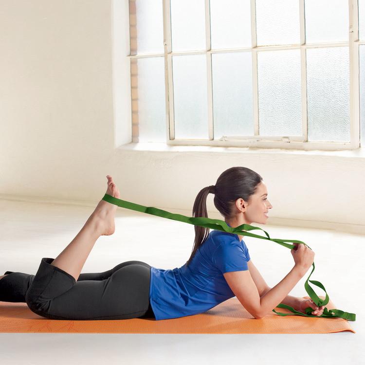 Woman with foot in Gaiam Restore Multi-Grip Stretch Strap
