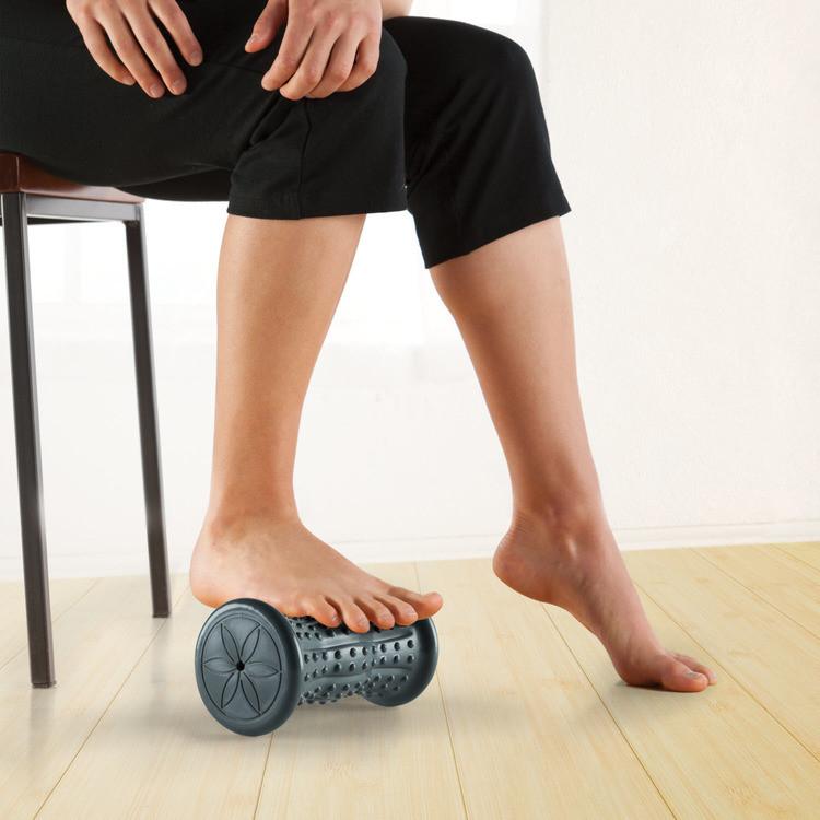 Restore Hot & Cold Foot Roller woman rolling
