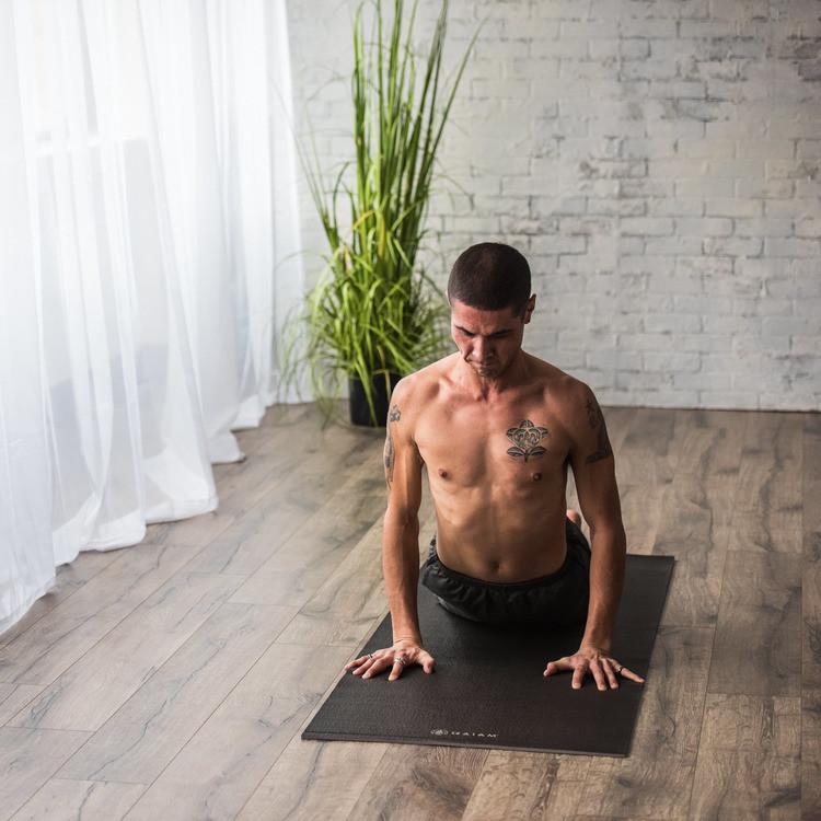 Black Easy-Roll Yoga Mat in use